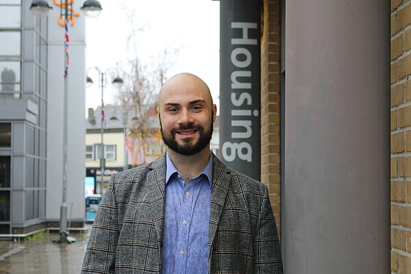 Chris Shank outside Shirley housing office